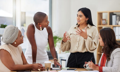 Women together diverse representation and in corporate outfit - IMD Business School